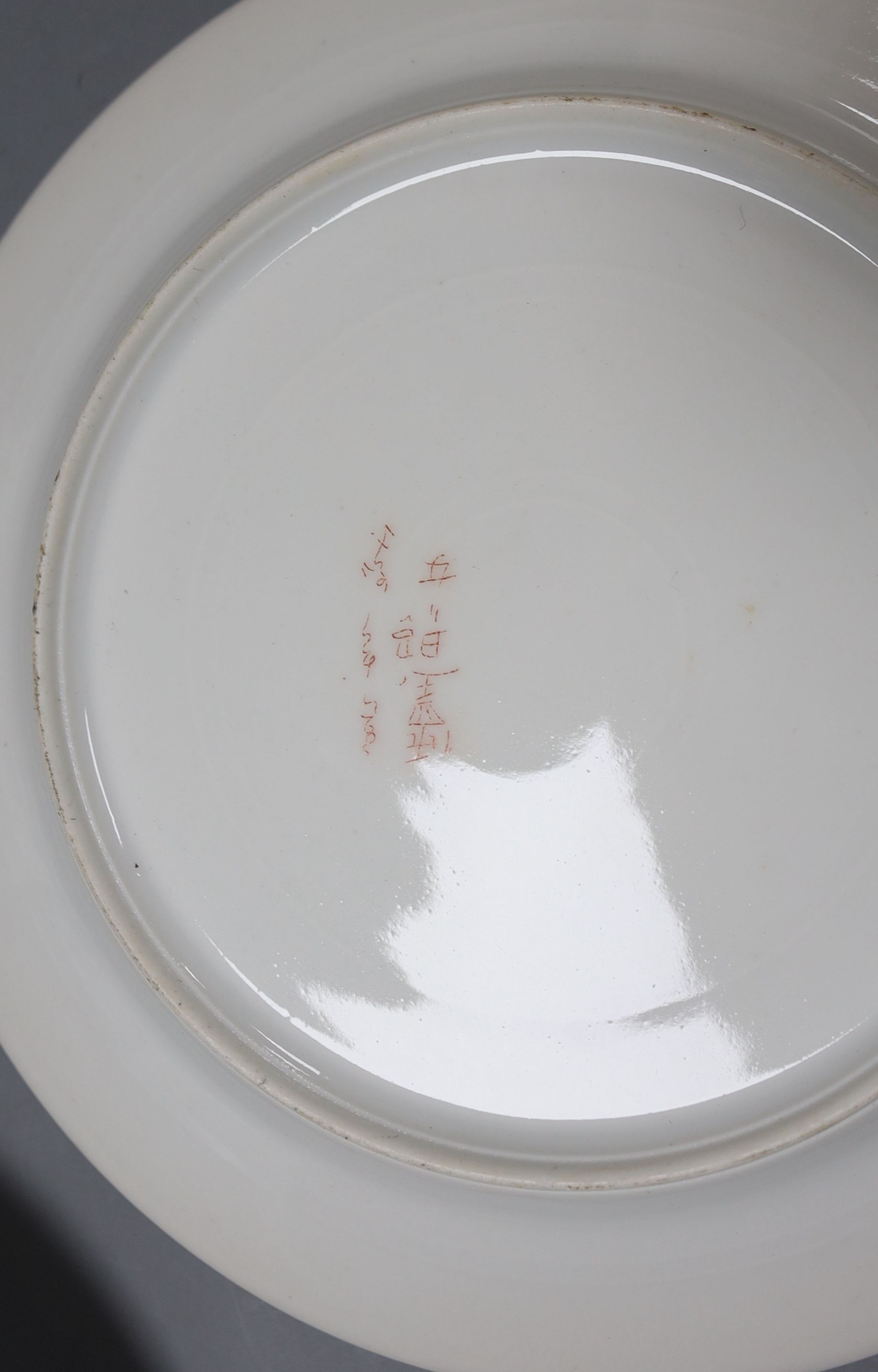 A set of six Japanese porcelain portrait plates, 20cm